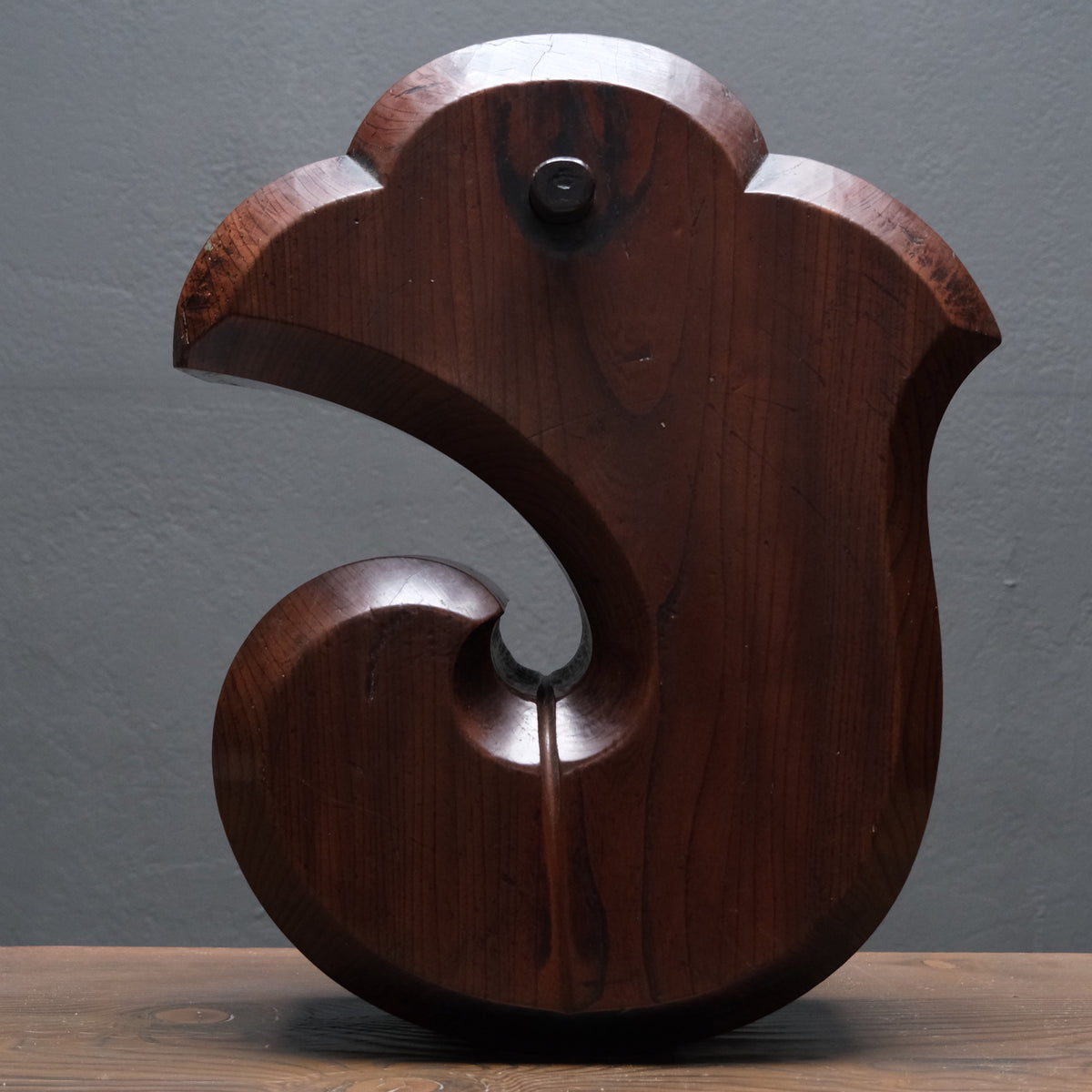 Large keyaki wood jizai hearth hook carved in a cloud form with near-black patina, view 1 of 13