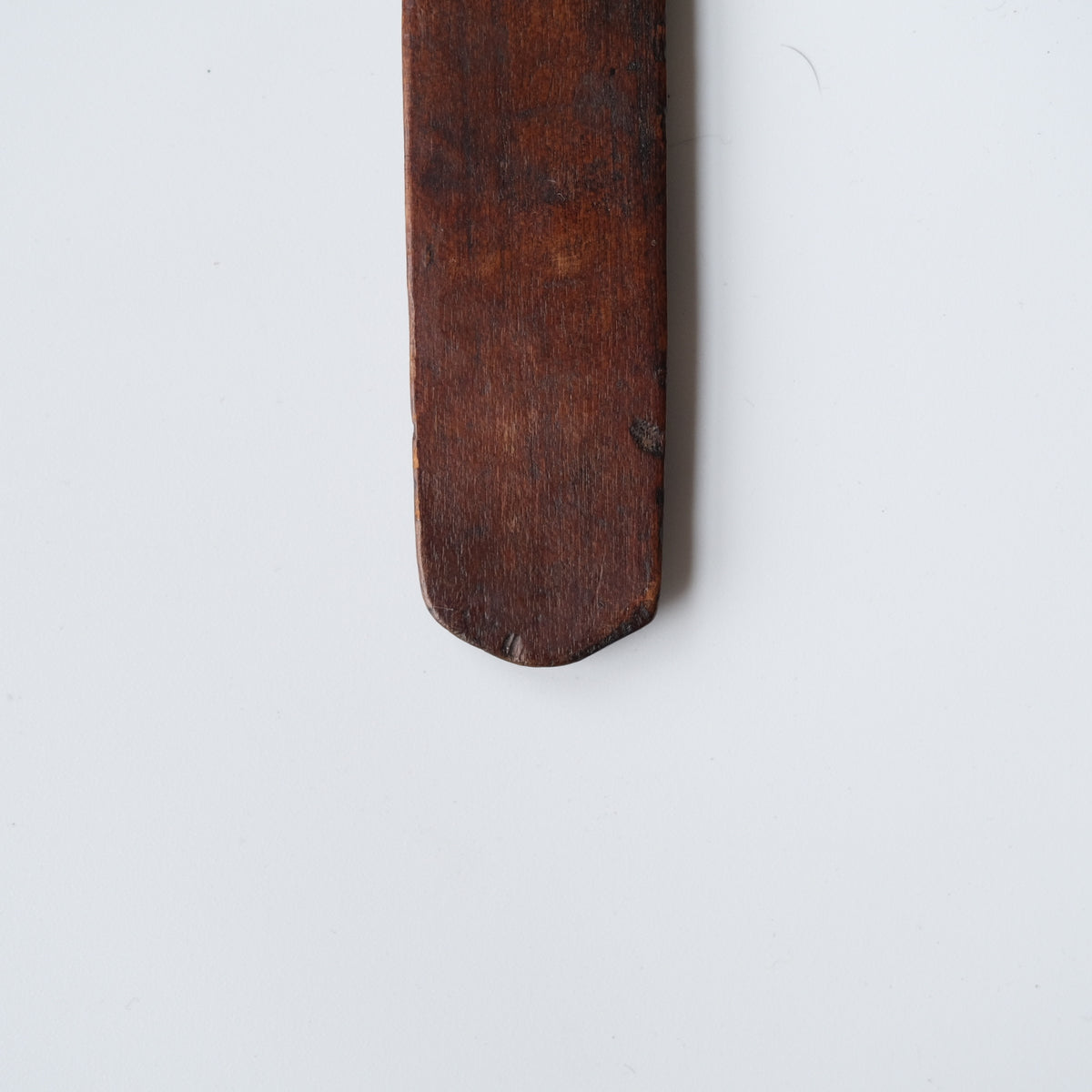 Ainu ikupasuy prayer stick carved in low relief with blade forms and a ringed boss, view 7 of 9