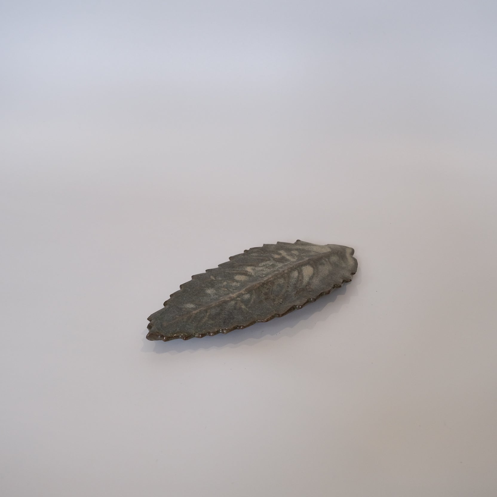 Japanese ceramic serving dish with decorative glazed surface