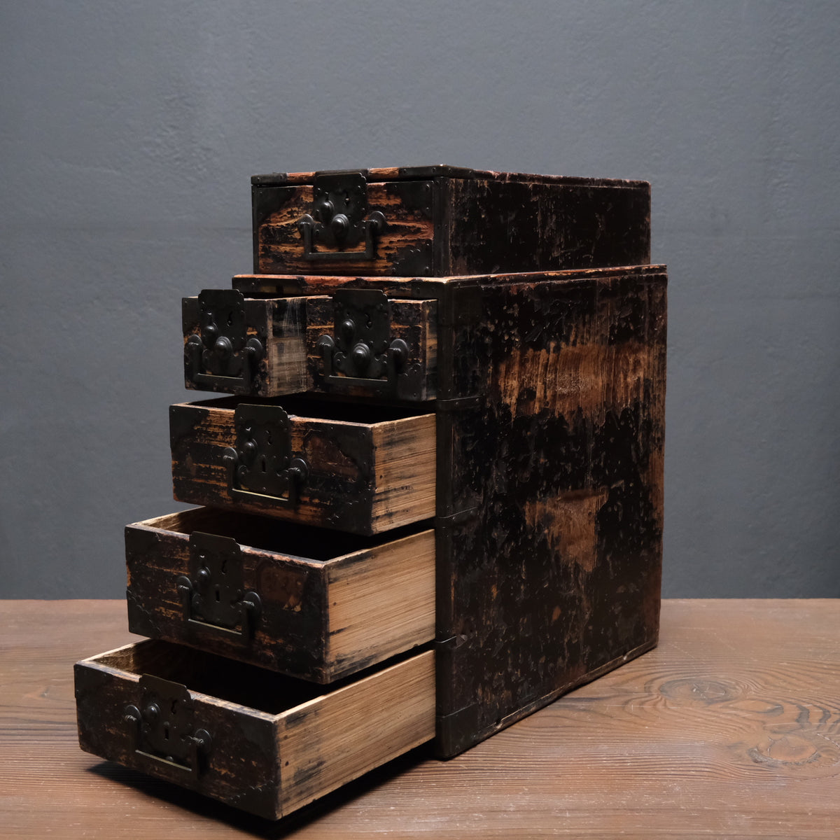 Portable wooden peddler's chest with five drawers and cloud-shaped iron lock plates, view 2 of 10