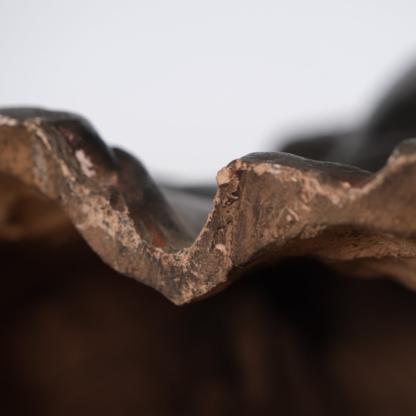 Side view of large Hotei figure showing depth, 10-inch depth