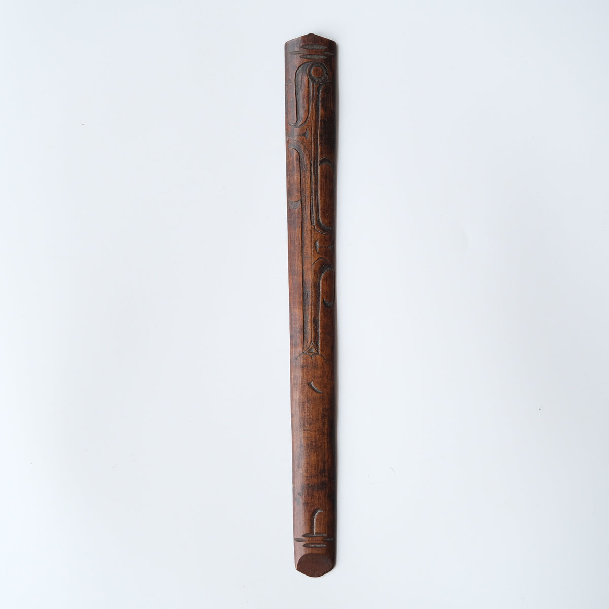 Ainu ikupasuy prayer stick carved in low relief with blade forms and a ringed boss, view 1 of 9