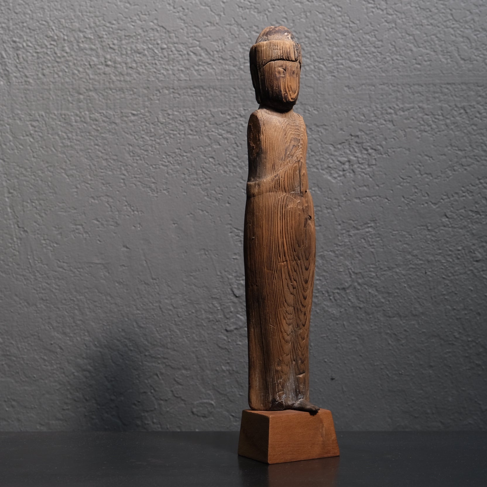 Stylized surface detail from elemental exposure on Heian period Kannon figure
