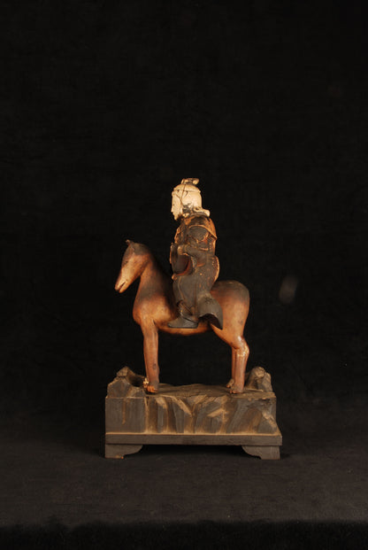 Detail of fox vehicle on Japanese Inari god carved wood sculpture