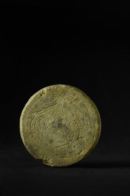 Close-up of stylized lotus petal design on Japanese roof tile end cap