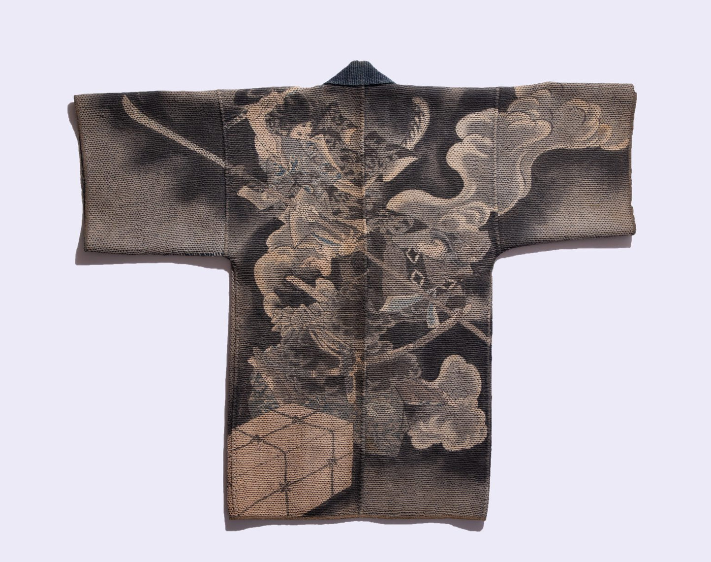 Close-up of dense sashiko stitching on Japanese indigo hanten fireman's coat