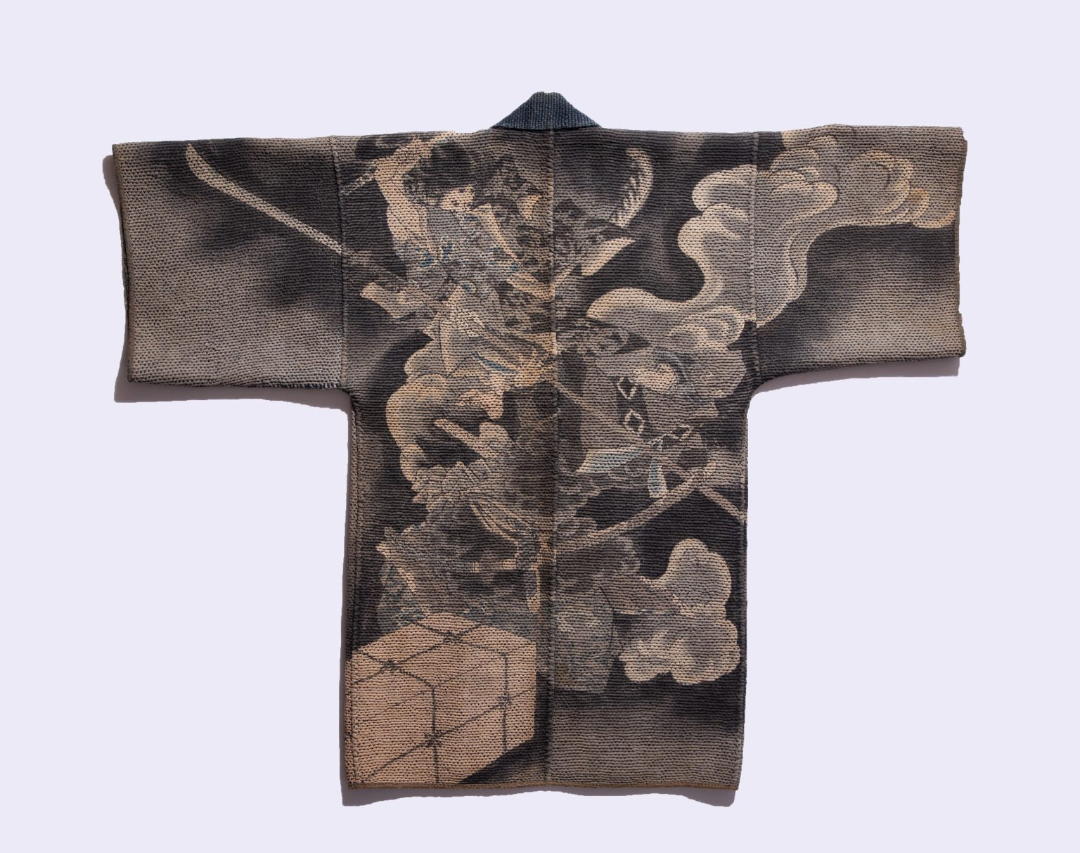 Close-up of dense sashiko stitching on Japanese indigo hanten fireman's coat