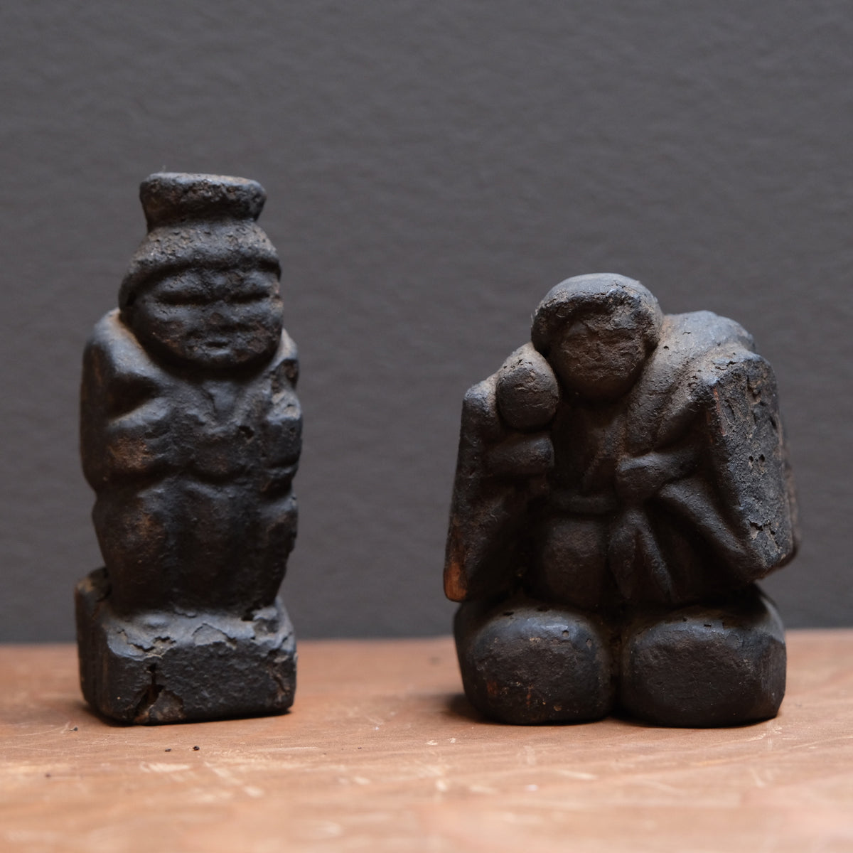 Pair of soot-darkened carved wood folk figures of Ebisu and Daikoku, view 2 of 8