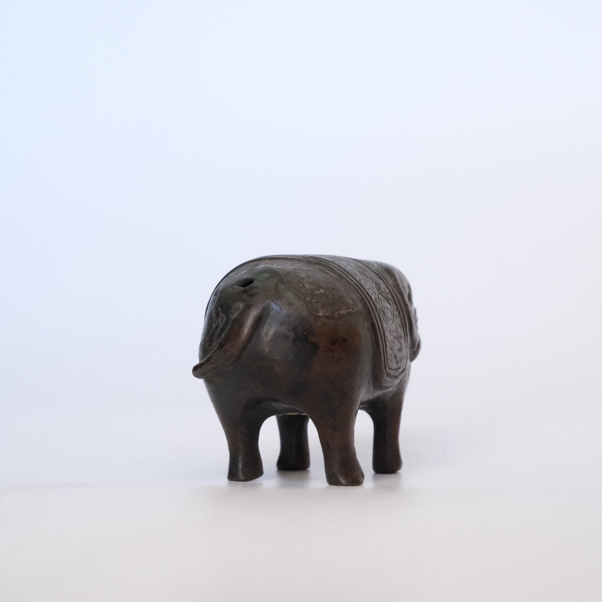 Small cast bronze elephant water dropper (suiteki) with incised caparison, view 3 of 8