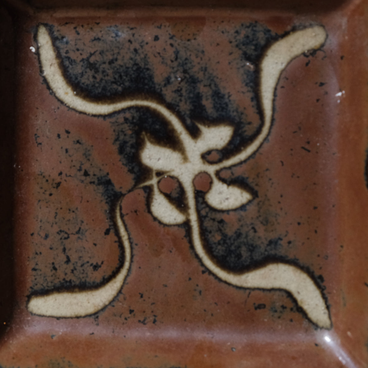 Shoji Hamada square stoneware dish with kaki glaze and wax-resist floral design, view 4 of 12