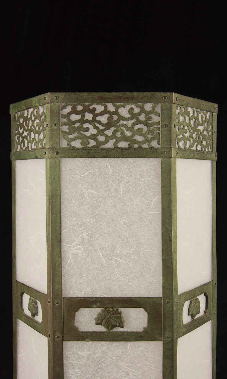 Detail of paulownia crest panel and chiseled inscription on Meirin Temple lantern