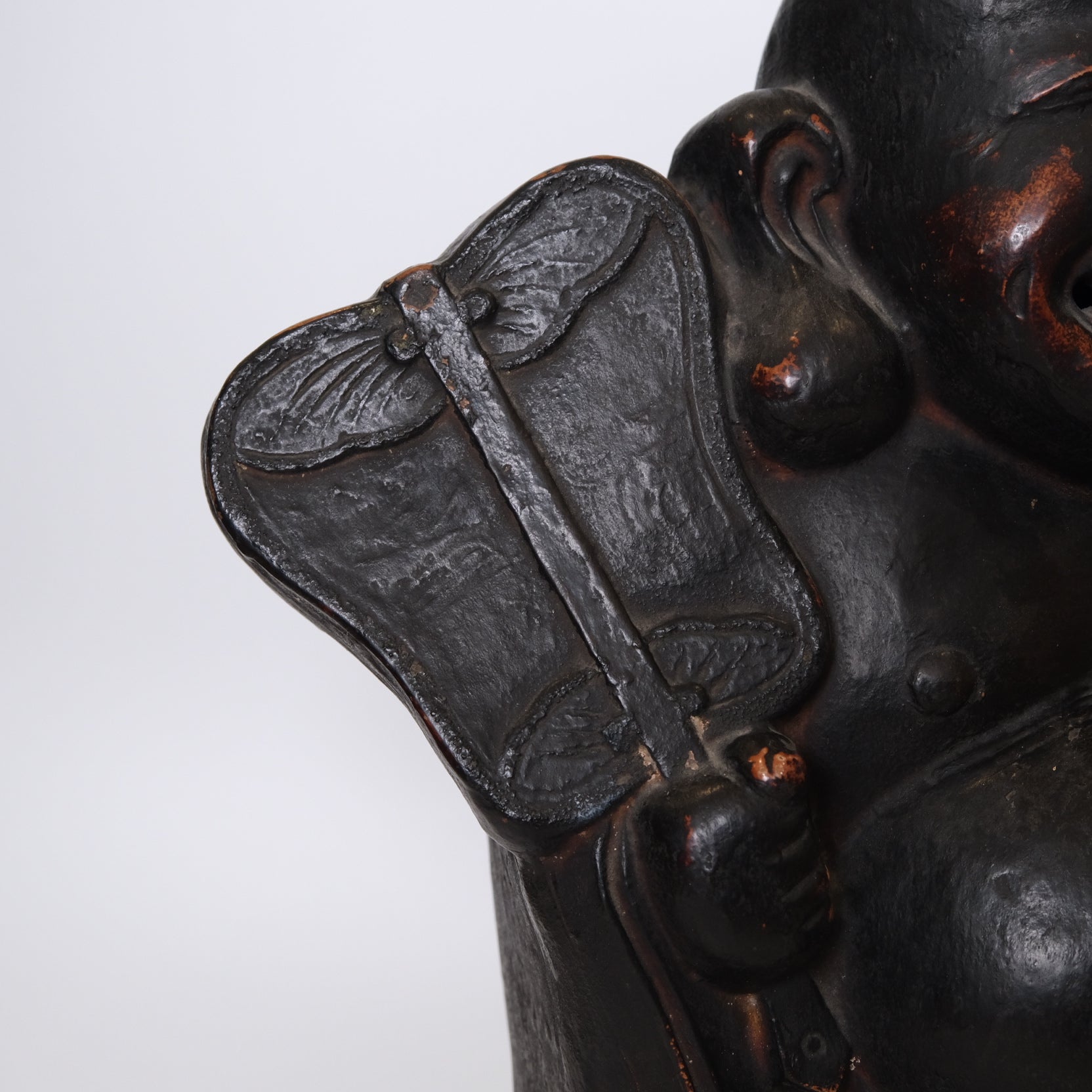Alternate angle of Edo period Japanese Hotei Laughing Buddha ceramic figure