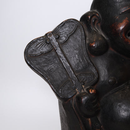 Alternate angle of Edo period Japanese Hotei Laughing Buddha ceramic figure