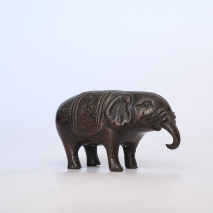 Small cast bronze elephant water dropper (suiteki) with incised caparison, view 5 of 8