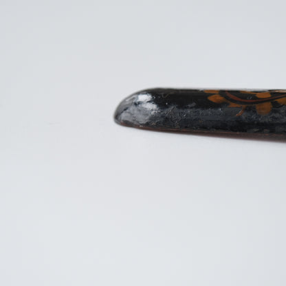 Ainu ikupasuy prayer stick in black lacquer painted with scrolling stems, red commas and gold rosettes, view 8 of 12