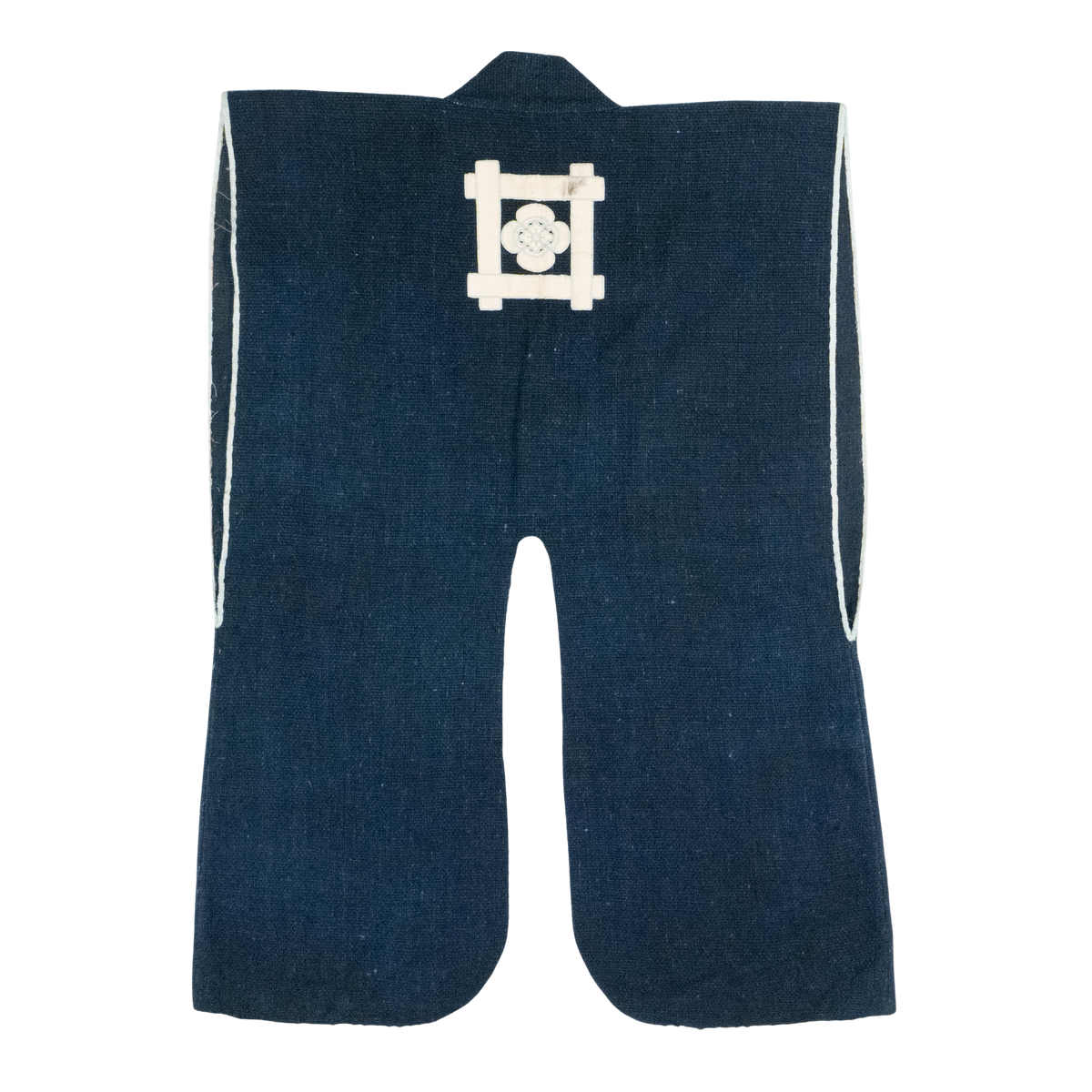 Indigo cotton jinbaori (sleeveless samurai surcoat) with white piping and appliqué igeta crest, view 1 of 3