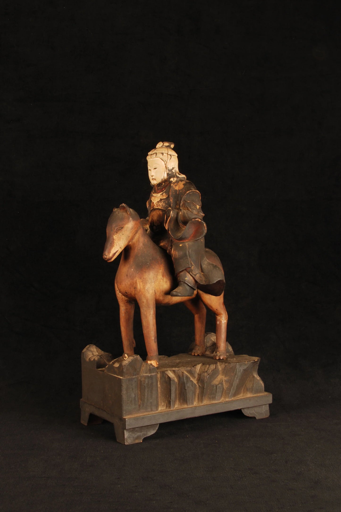 Reverse of Japanese Inari god on fox carved wood sculpture