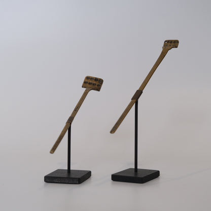 Meiji period metal pill form side view showing dimpled surface on stand