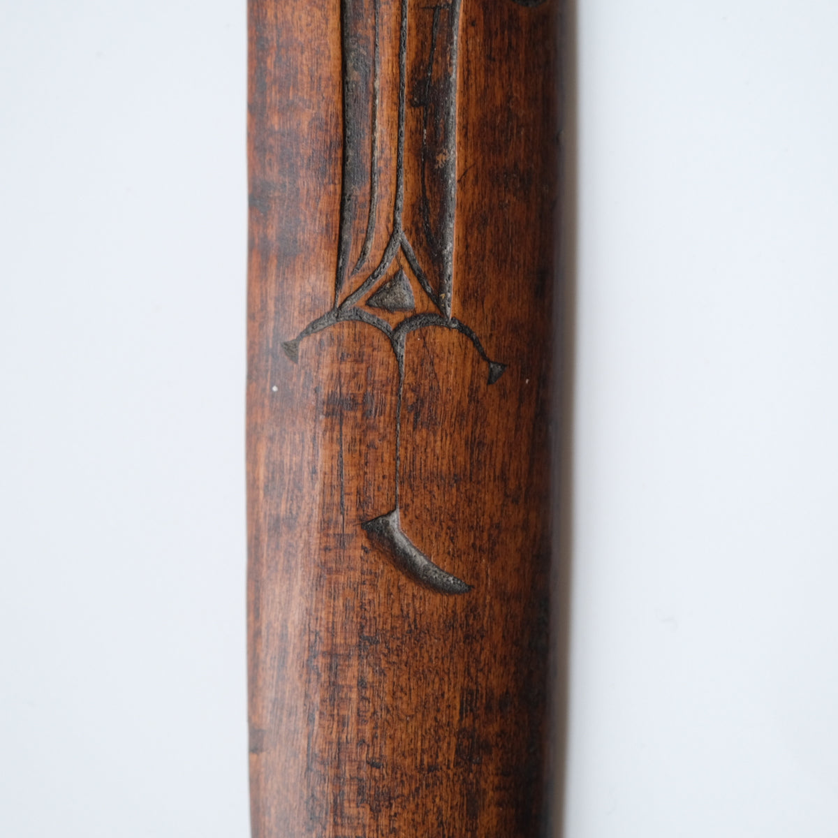 Ainu ikupasuy prayer stick carved in low relief with blade forms and a ringed boss, view 4 of 9