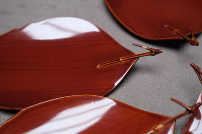 Set of five lacquered leaf-shaped plates with their original box, view 5 of 12