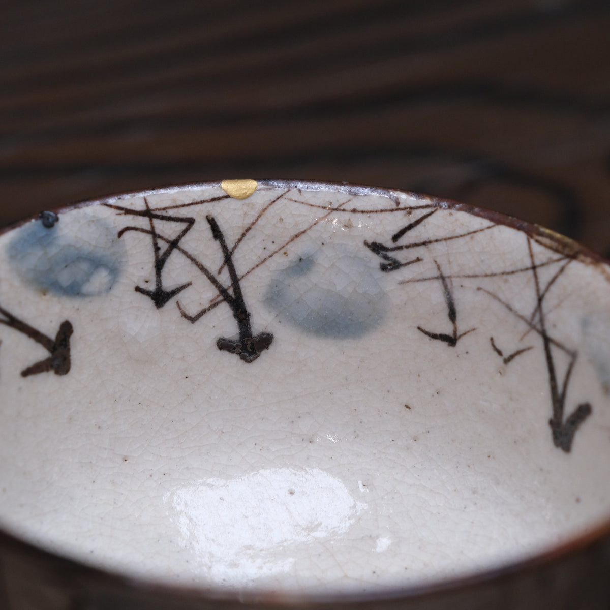 Kyo-yaki bowl with brushed susuki grass design and gold kintsugi repairs, view 5 of 10