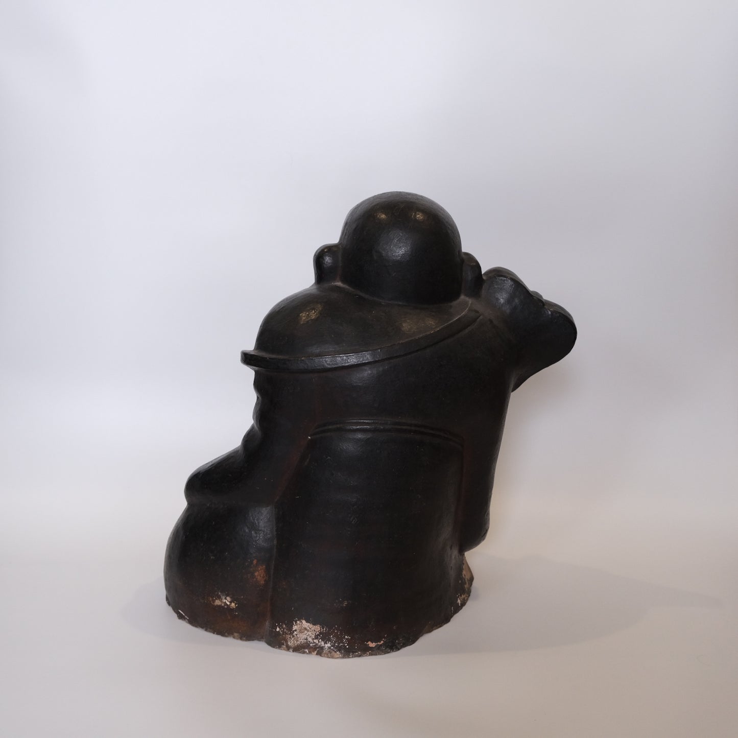 Close-up of ceramic molded surface on late 18th/early 19th century Hotei figure
