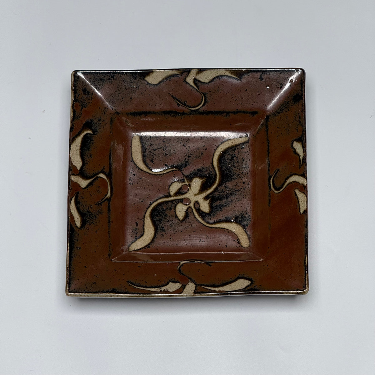 Shoji Hamada square stoneware dish with kaki glaze and wax-resist floral design, view 9 of 12