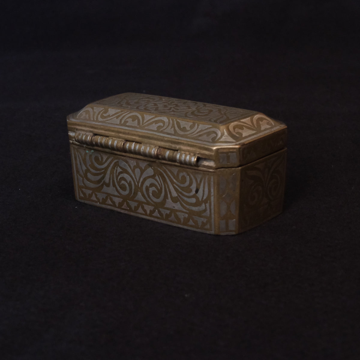 Maranao brass betel nut box engraved with silver-inlaid okir scrollwork, view 6 of 10