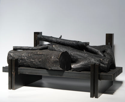Bronze decorative logs detail showing casting and patina