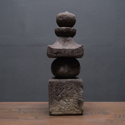 Weathered stone gorinto, a five-element Buddhist memorial stupa inscribed with Sanskrit seed characters, view 6 of 12
