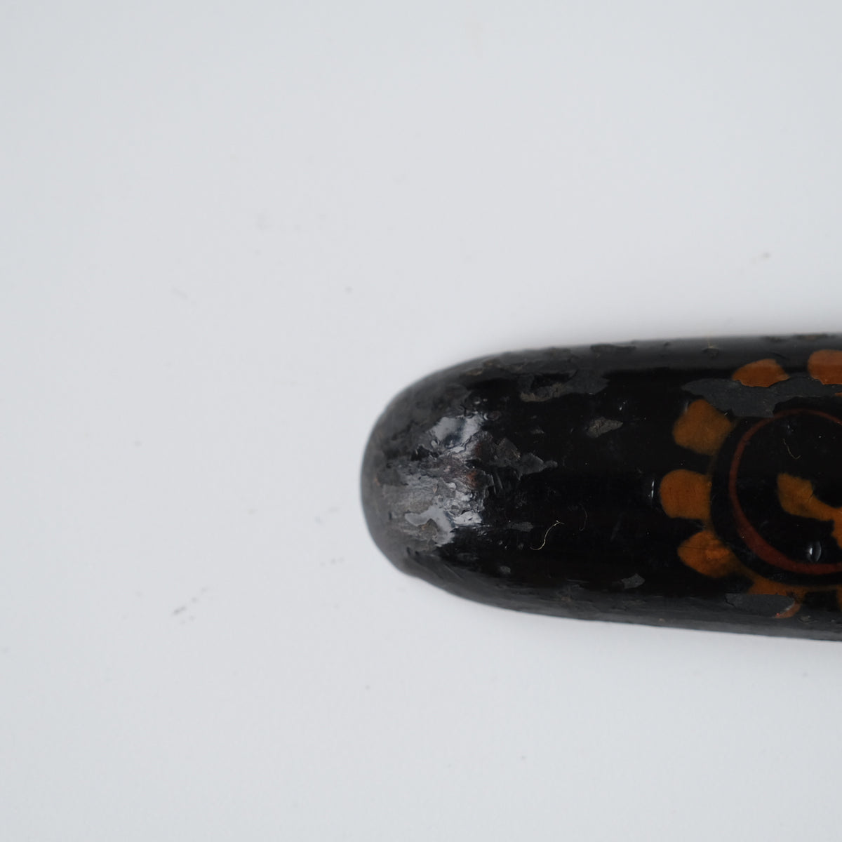 Ainu ikupasuy prayer stick in black lacquer painted with scrolling stems, red commas and gold rosettes, view 7 of 12