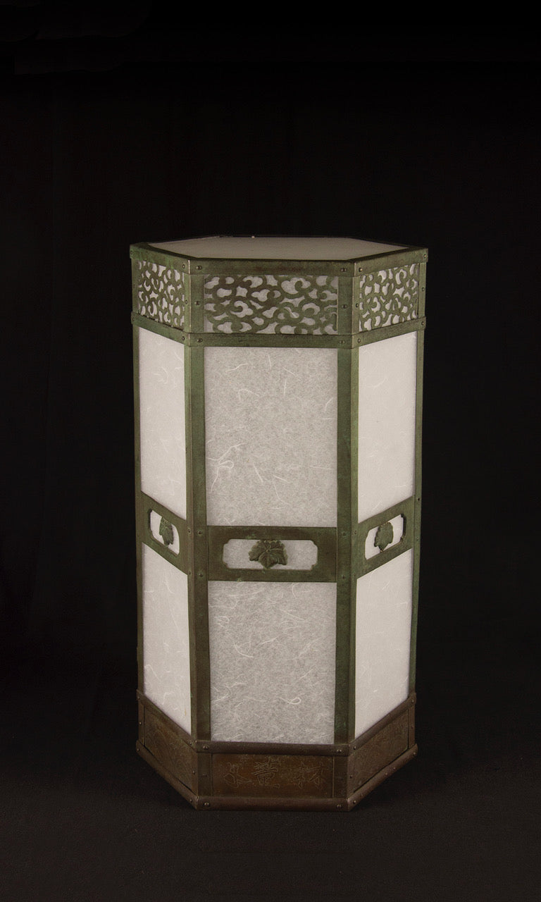 Close-up of cloud karakusa piercework band on Meiji 26 temple copper lantern