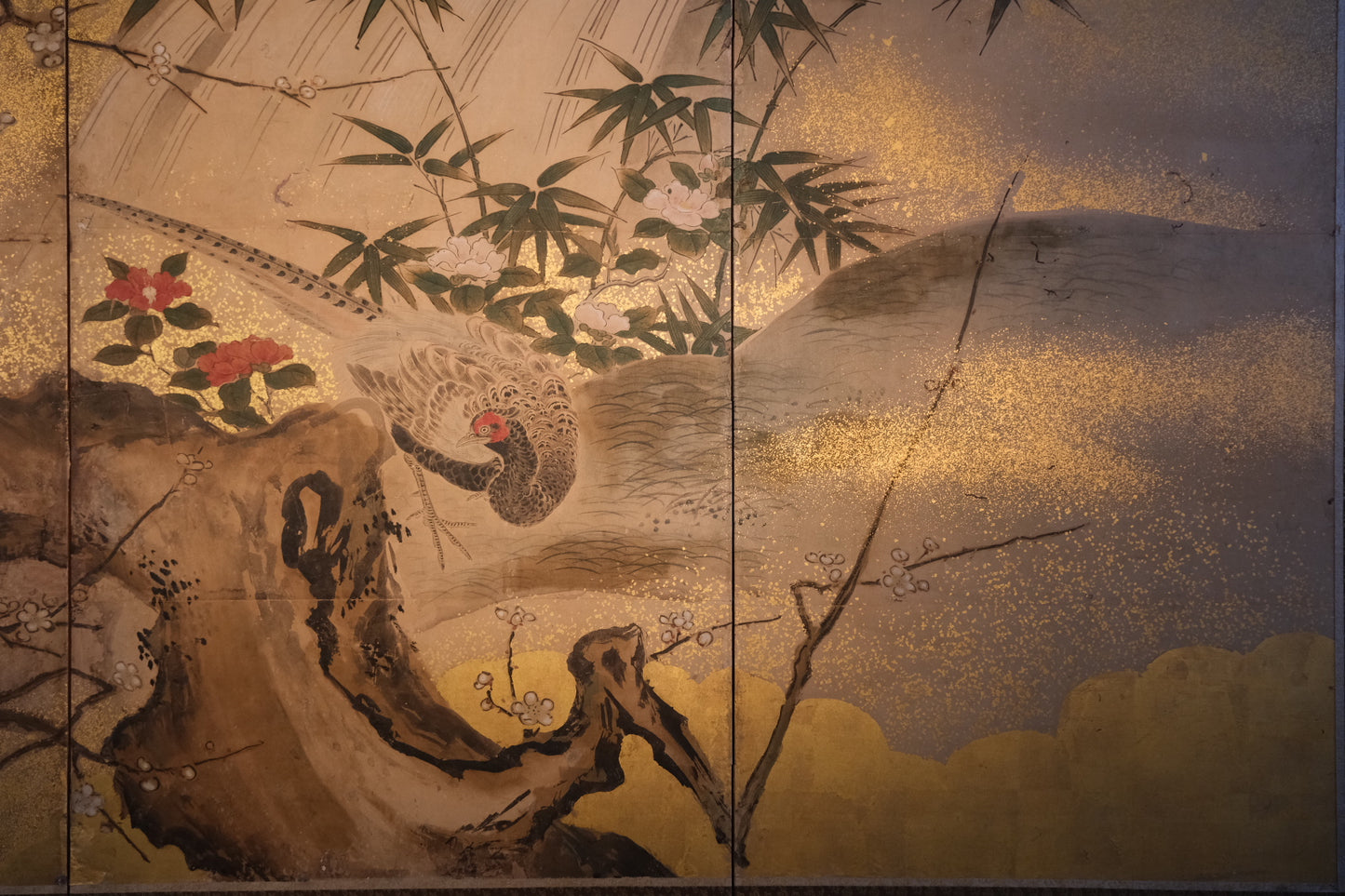 Close-up of plum tree blossoms on 19th century Kano school folding screen