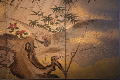 Close-up of plum tree blossoms on 19th century Kano school folding screen