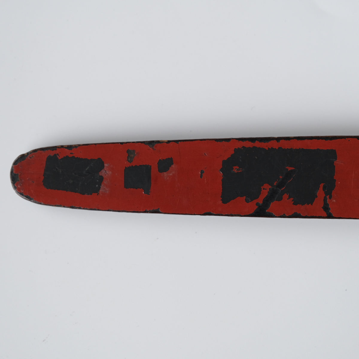 Ainu ikupasuy prayer stick in black lacquer painted with scrolling stems, red commas and gold rosettes, view 12 of 12
