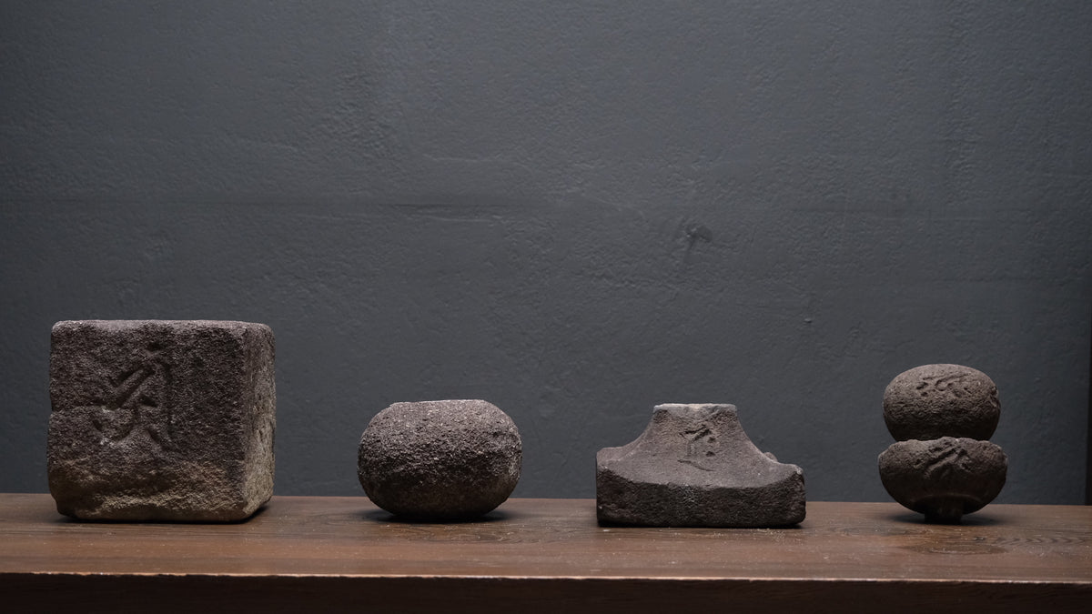 Weathered stone gorinto, a five-element Buddhist memorial stupa inscribed with Sanskrit seed characters, view 8 of 12