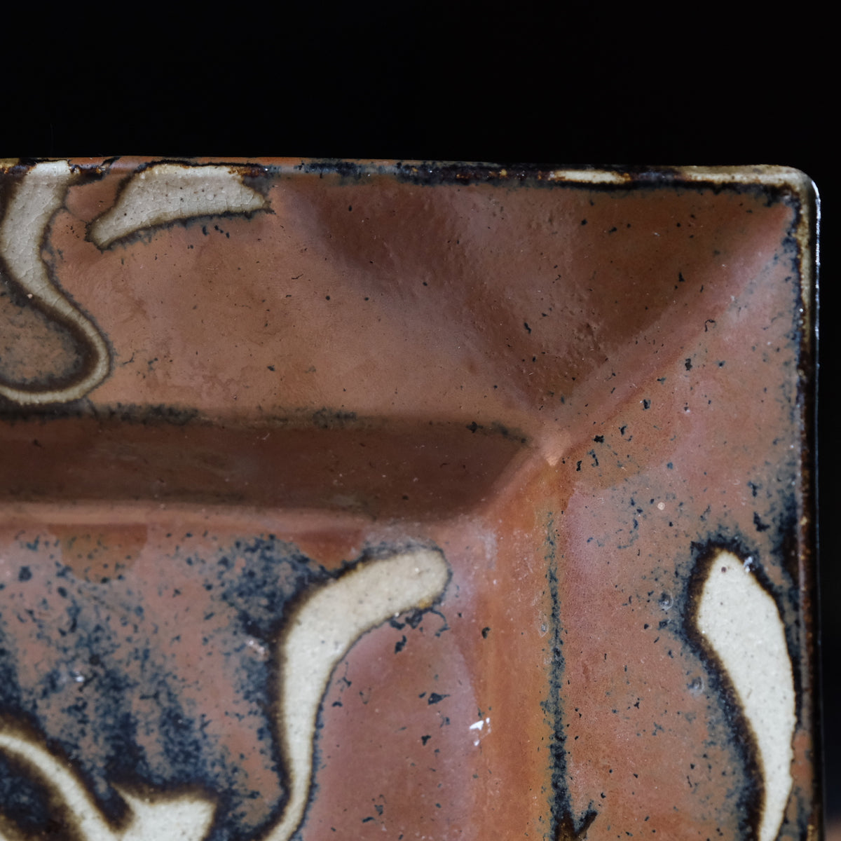 Shoji Hamada square stoneware dish with kaki glaze and wax-resist floral design, view 5 of 12