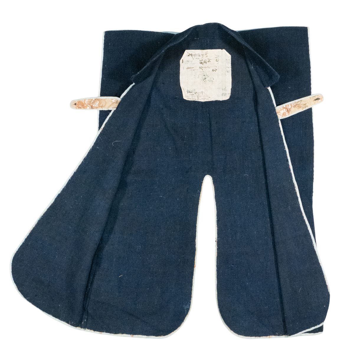 Indigo cotton jinbaori (sleeveless samurai surcoat) with white piping and appliqué igeta crest, view 3 of 3