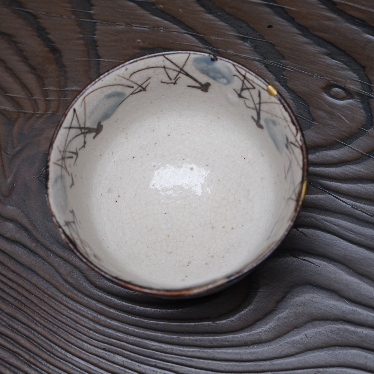 Kyo-yaki bowl with brushed susuki grass design and gold kintsugi repairs, view 6 of 10