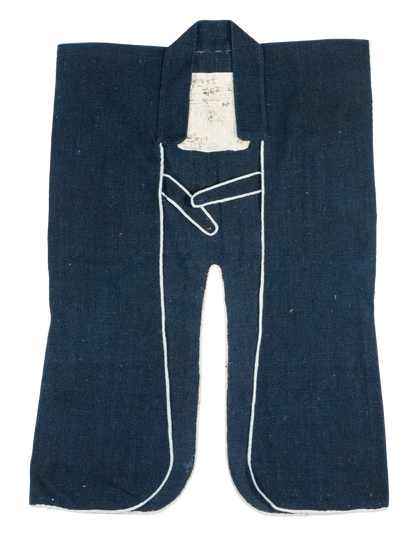 Indigo cotton jinbaori (sleeveless samurai surcoat) with white piping and appliqué igeta crest, view 2 of 3