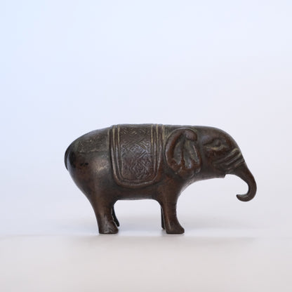 Small cast bronze elephant water dropper (suiteki) with incised caparison, view 4 of 8