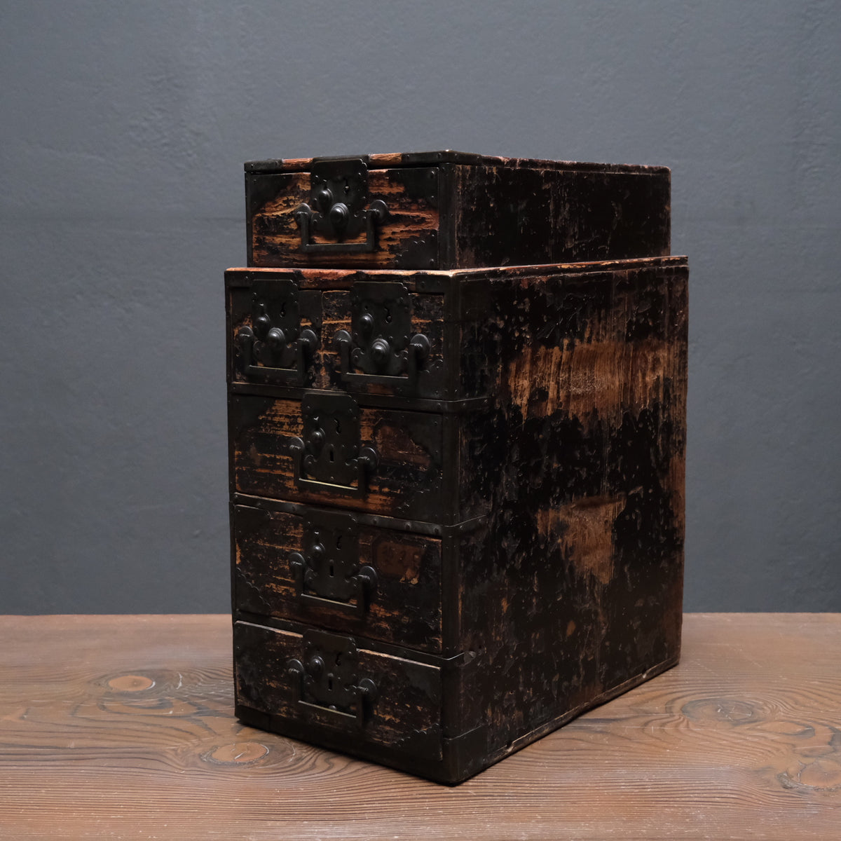 Portable wooden peddler's chest with five drawers and cloud-shaped iron lock plates, view 1 of 10