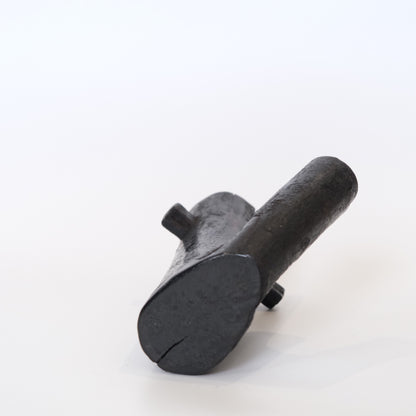 Three-quarter view of Japanese mingei folk art hearth hook, well-patinated