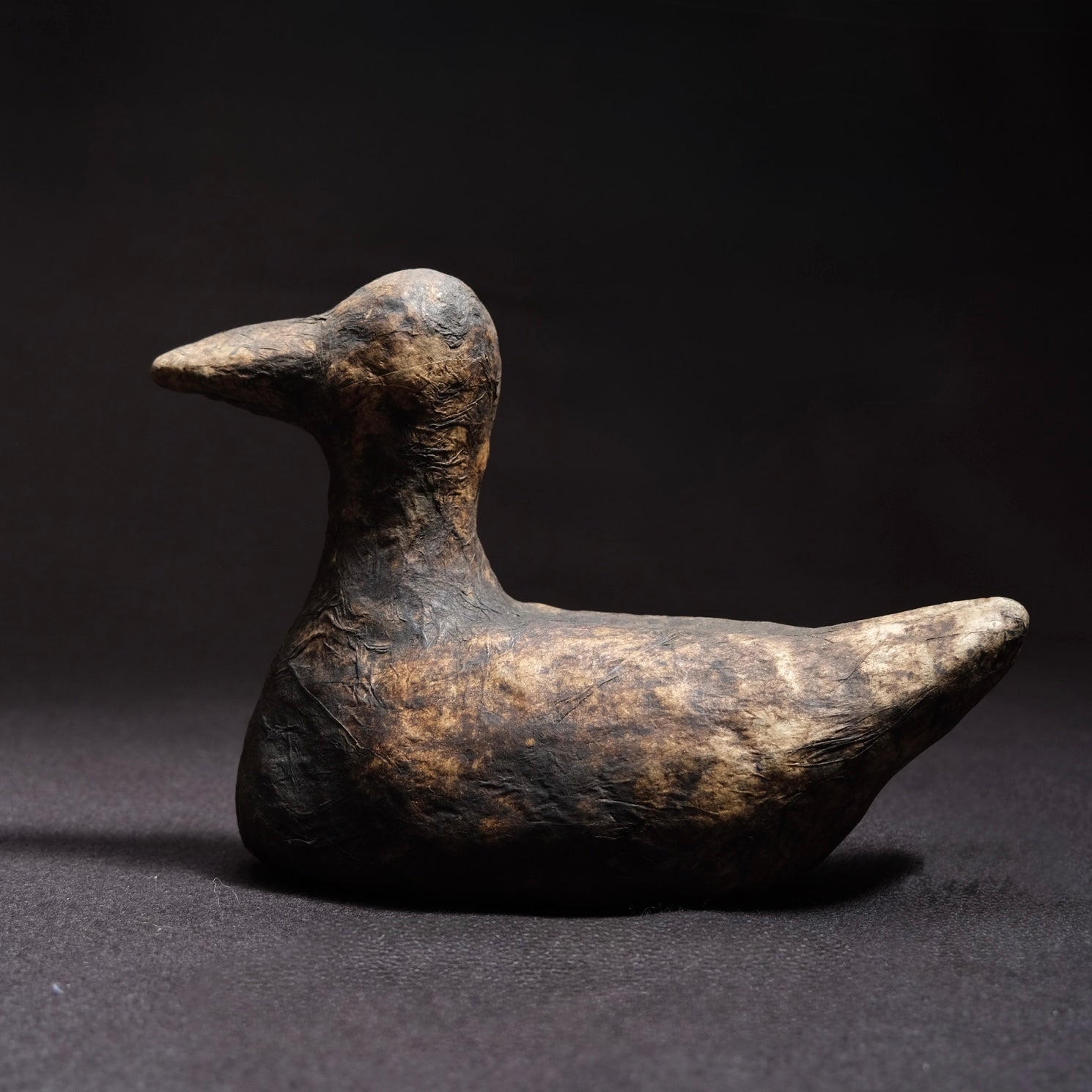 Wrapped Duck Decoy — carved duck wrapped in kakabushi paper with kanji, 19-20c. Japan or Korea