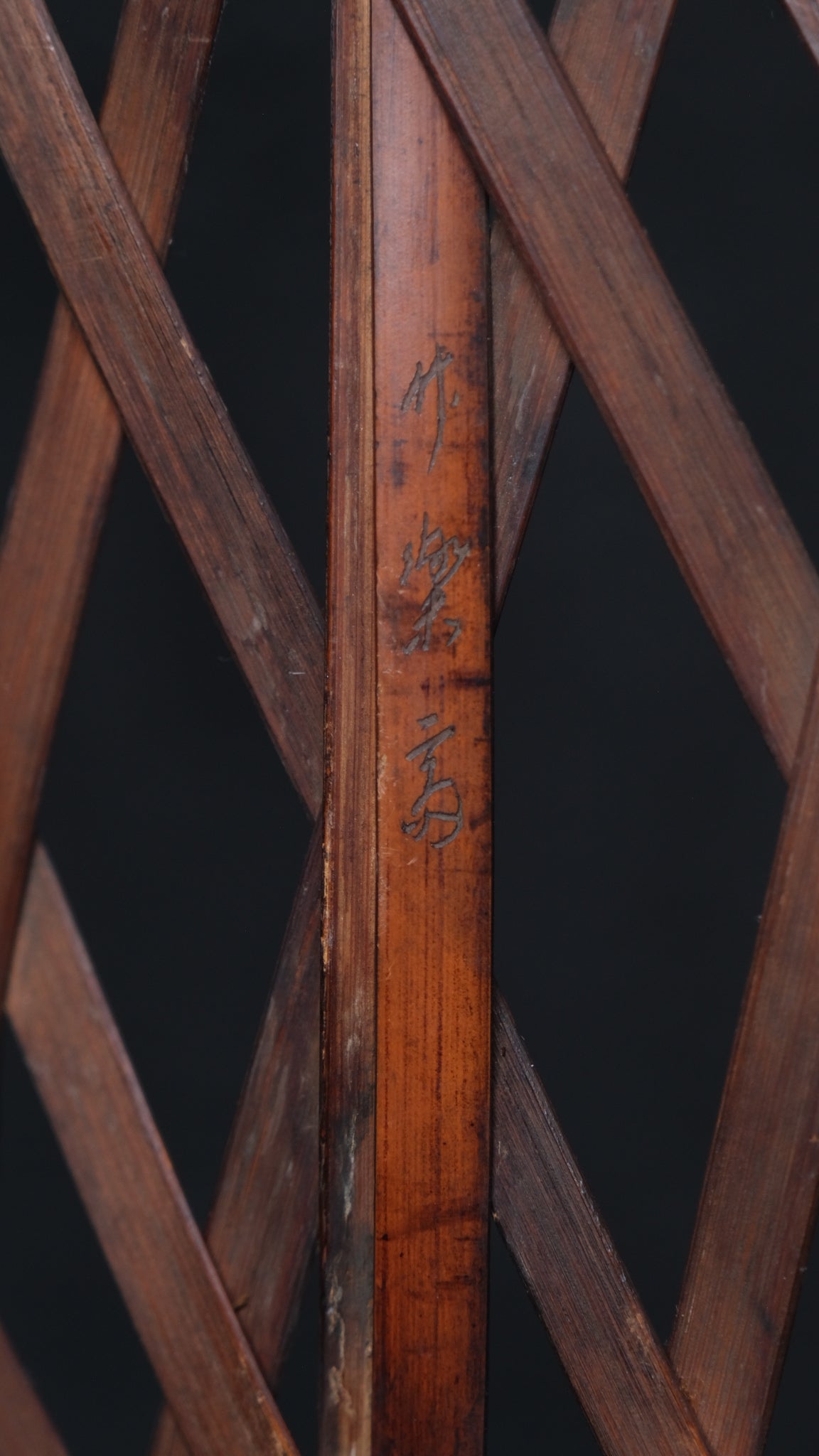 Close-up of madake bamboo material on signed elliptical Japanese basket
