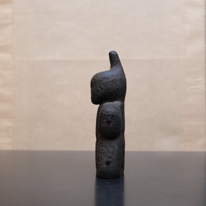 Detail of three interlocking carved wooden sections on Japanese shinzo figure