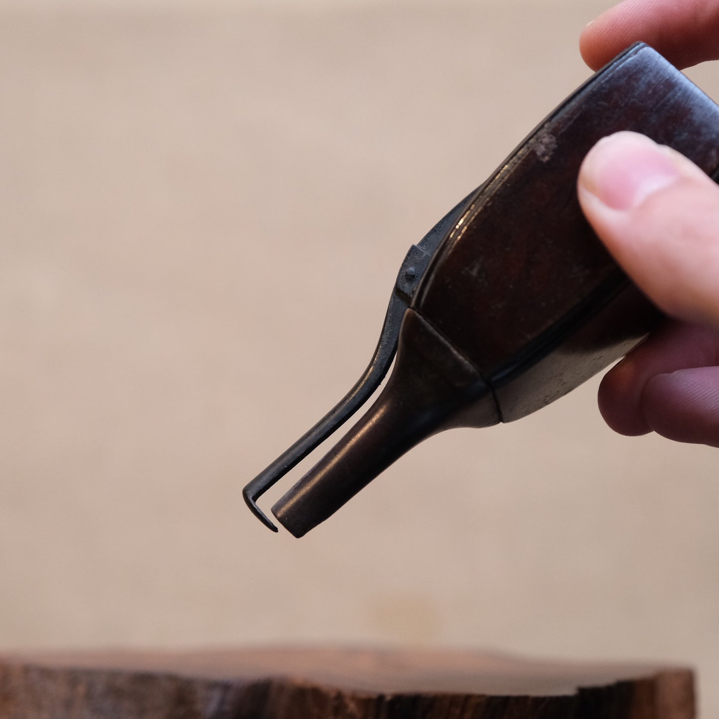 Close-up of wood grain on 18-19th century Japanese wooden gunpowder flask
