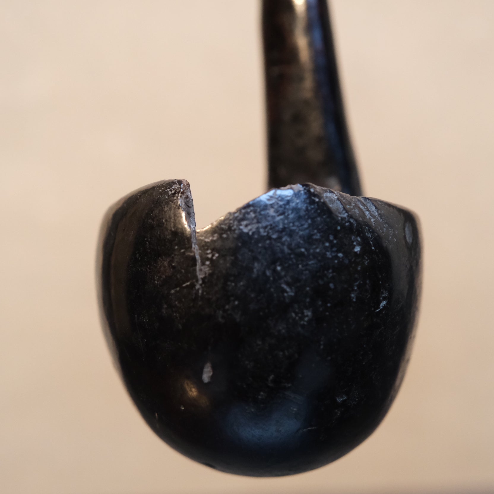 Detail of aged wood on Philippine folk ladle showing long use patina