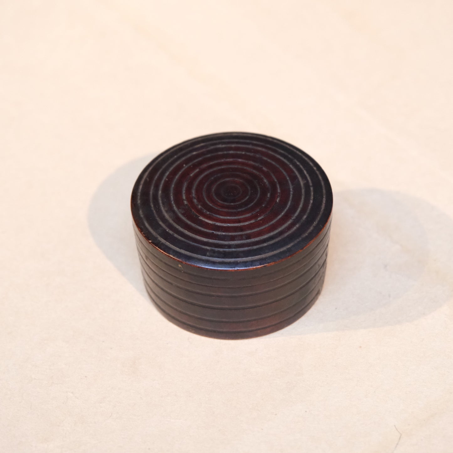 Turned wooden perfume container with fitted lid, lathe-worked object