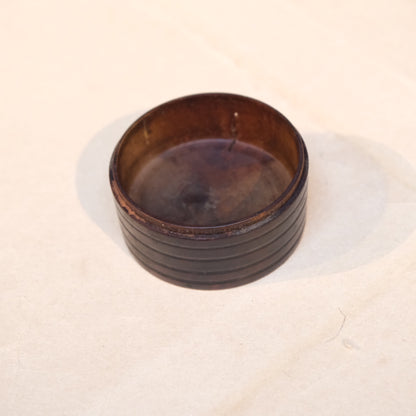 Detail of threaded screw-on lid on Japanese turned wood perfume container